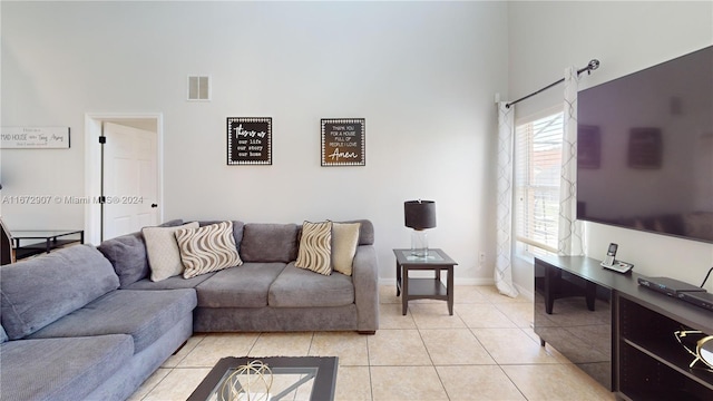 living room featuring light tile patterned floors