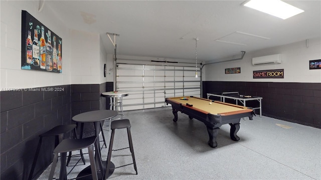 recreation room featuring a wall mounted air conditioner and billiards