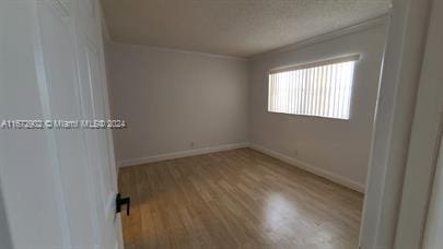 empty room with light wood-type flooring