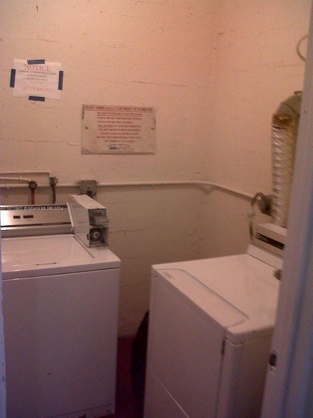 washroom featuring separate washer and dryer