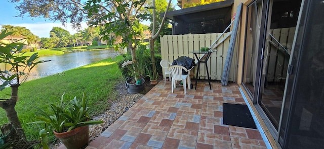 view of patio / terrace featuring a water view