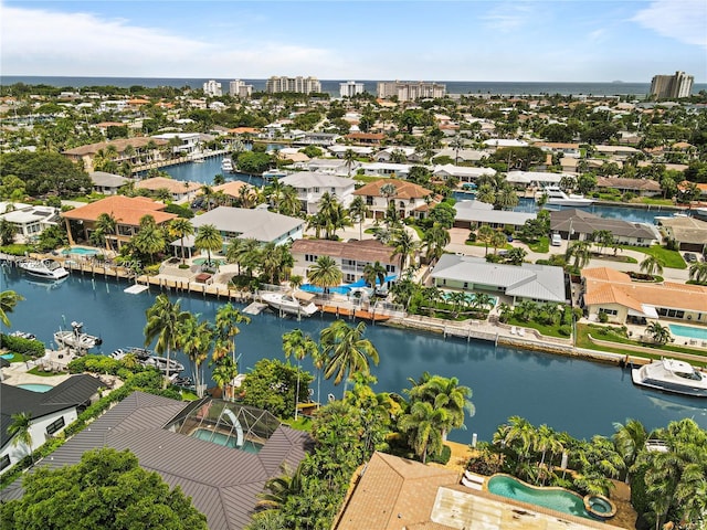 birds eye view of property featuring a water view