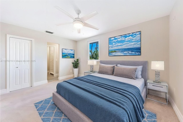 carpeted bedroom featuring ceiling fan