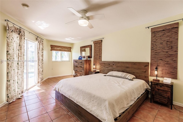 bedroom featuring ceiling fan, tile patterned flooring, and access to outside