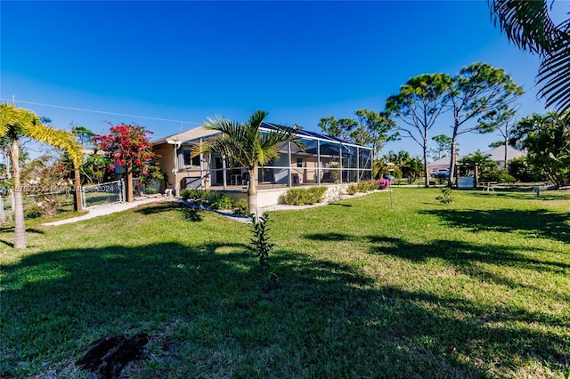 view of yard featuring a lanai