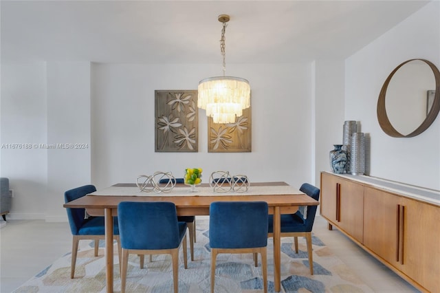 dining space featuring a chandelier