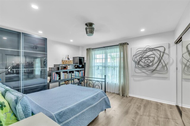 bedroom featuring hardwood / wood-style flooring