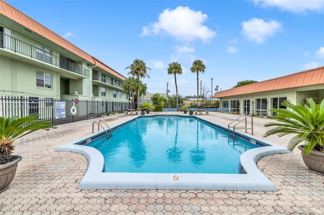 view of pool with a patio area