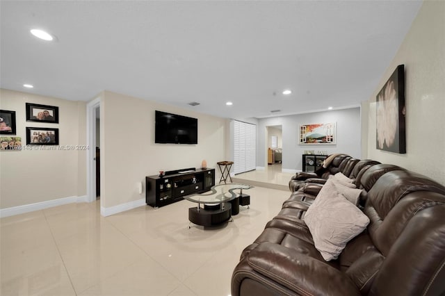 living room featuring light tile patterned floors