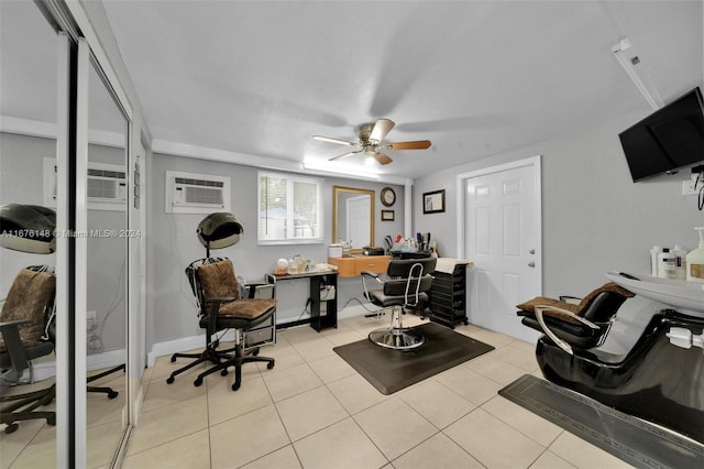 home office featuring an AC wall unit, light tile patterned floors, and ceiling fan