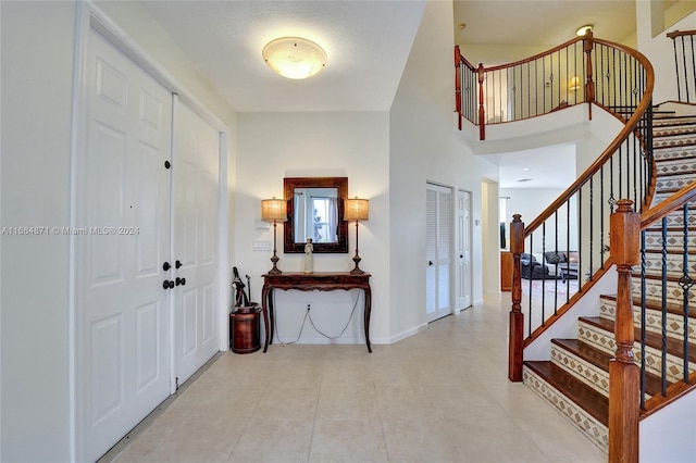 entrance foyer featuring light tile patterned floors