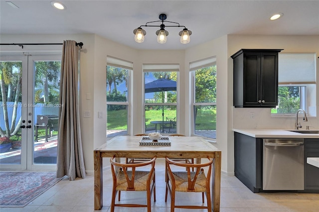 tiled dining space with french doors and sink