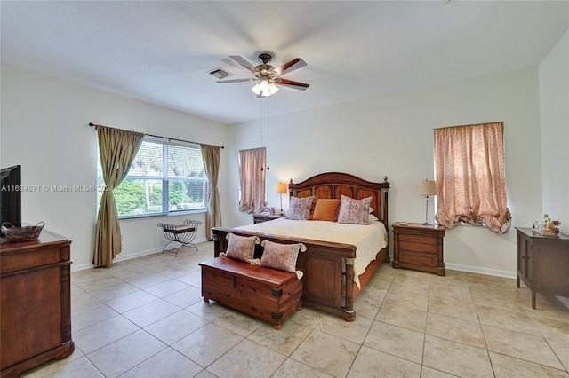 bedroom featuring light tile patterned floors and ceiling fan