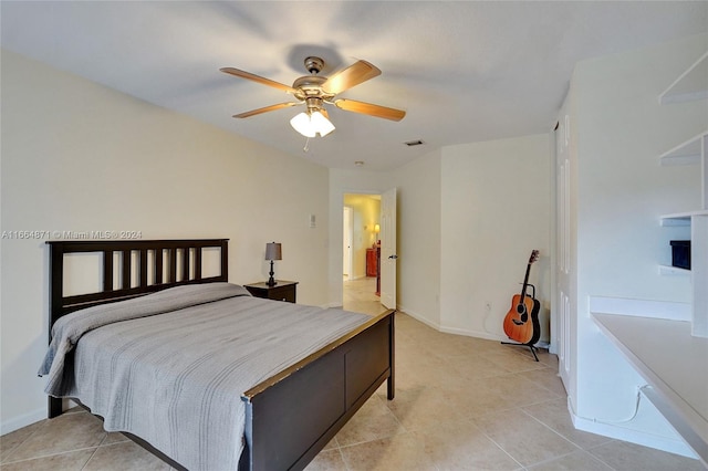 bedroom featuring ceiling fan and light tile patterned floors