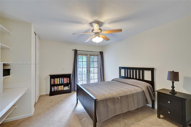 bedroom with french doors, light tile patterned floors, and ceiling fan