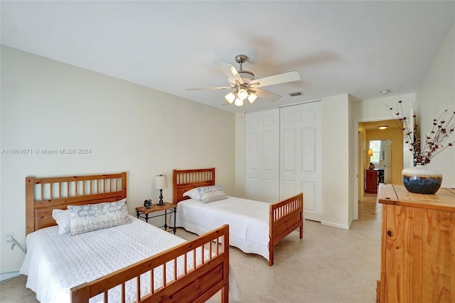 bedroom with a closet and ceiling fan