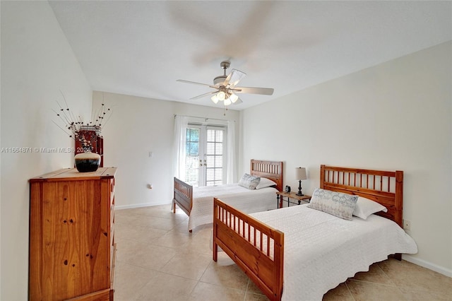 bedroom with french doors, light tile patterned floors, and ceiling fan