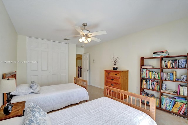 bedroom featuring a closet and ceiling fan