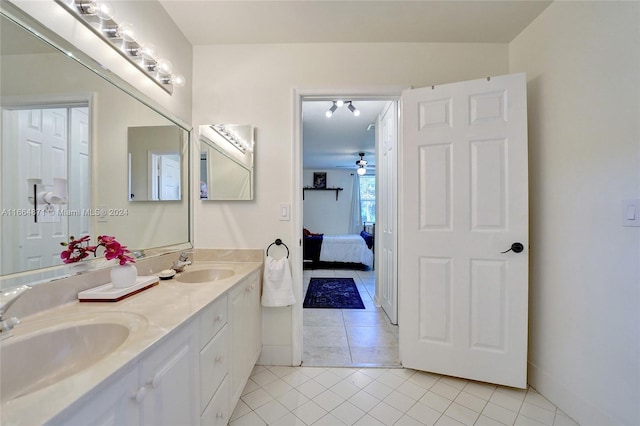 bathroom with vanity, ceiling fan, and tile patterned floors