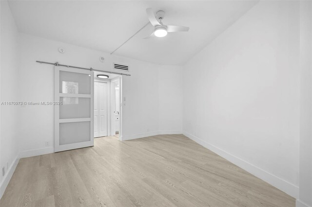 unfurnished room featuring light hardwood / wood-style floors