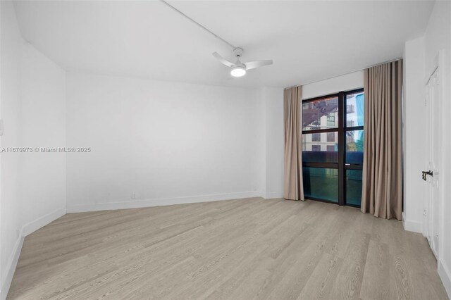 unfurnished room featuring light hardwood / wood-style flooring