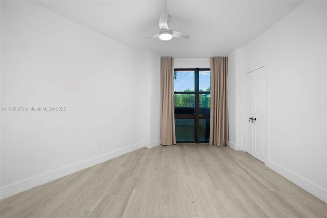 spare room featuring light hardwood / wood-style floors