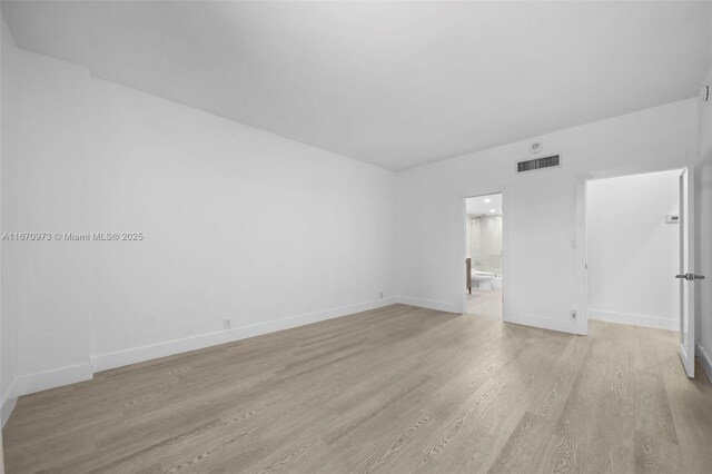 bathroom with vanity, tile patterned floors, toilet, and walk in shower