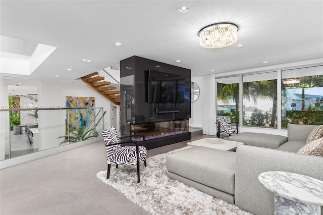 living room featuring a chandelier