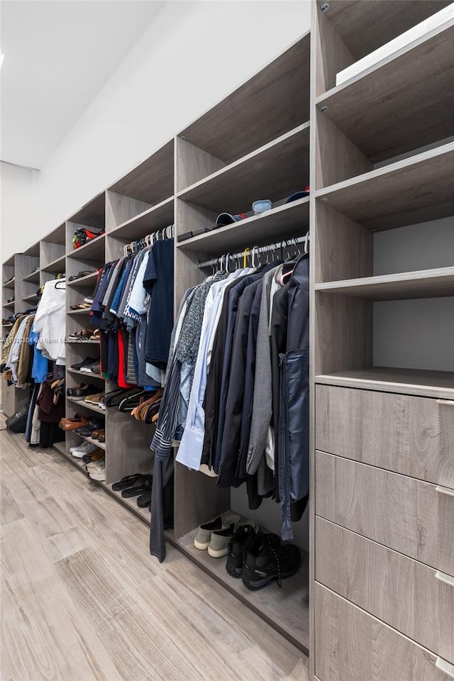 walk in closet featuring light wood-type flooring