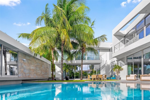 view of pool featuring a patio area