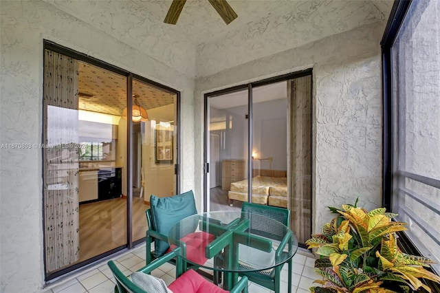 sunroom / solarium with ceiling fan