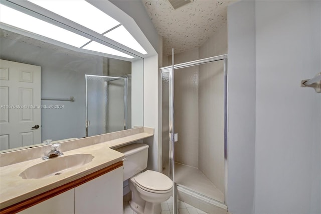 bathroom with tile patterned flooring, vanity, toilet, and an enclosed shower