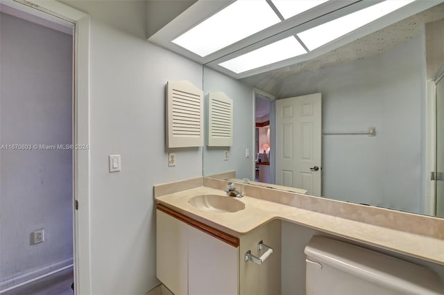 bathroom with toilet and sink