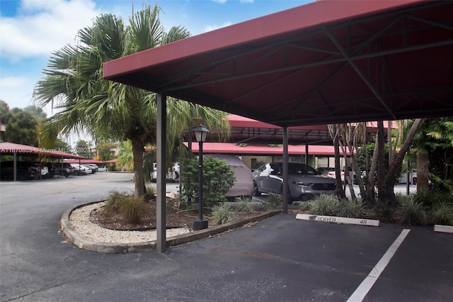 view of car parking with a carport