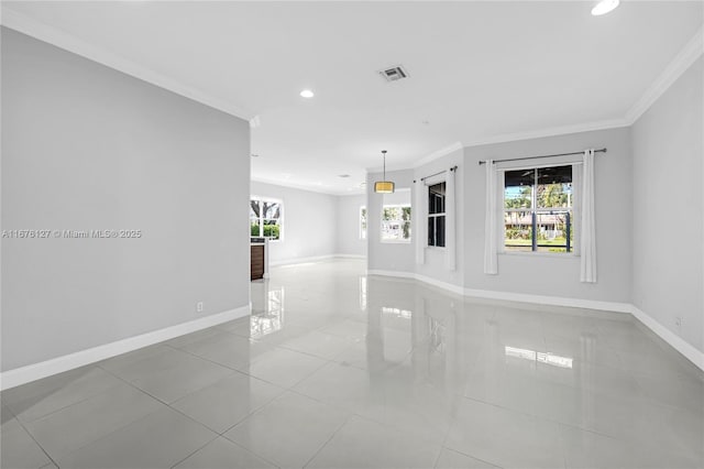 tiled empty room with crown molding