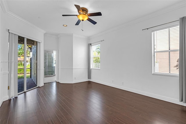 spare room featuring ornamental molding, dark hardwood / wood-style floors, and ceiling fan