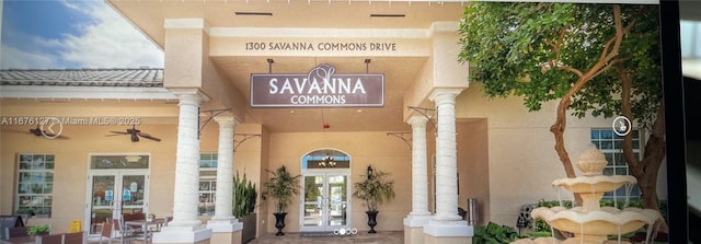 view of exterior entry featuring french doors