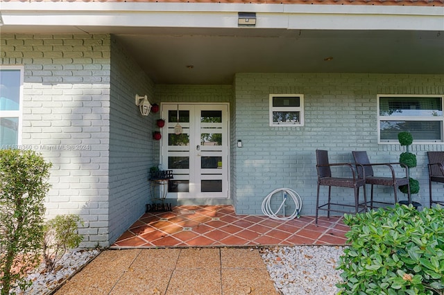 property entrance with a patio