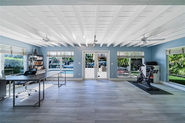 gym featuring plenty of natural light, wood ceiling, and french doors