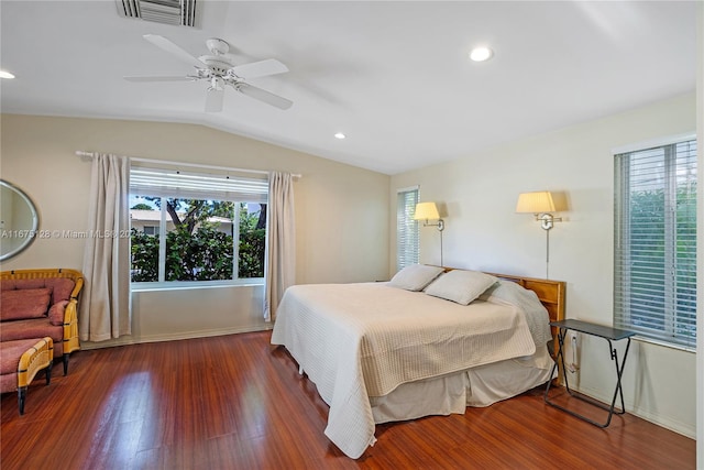 bedroom with dark hardwood / wood-style floors, ceiling fan, and lofted ceiling