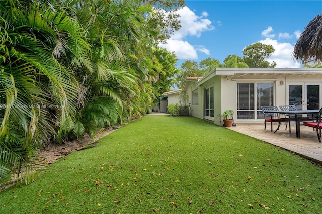 view of yard with a patio area