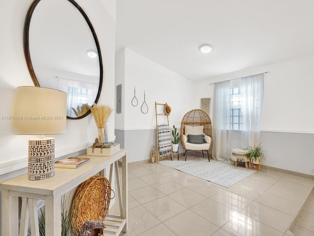 sitting room with light tile patterned floors