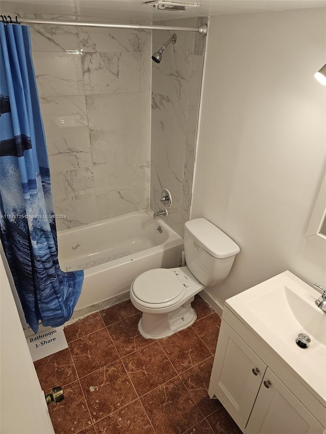 full bathroom with shower / bath combo with shower curtain, toilet, and vanity