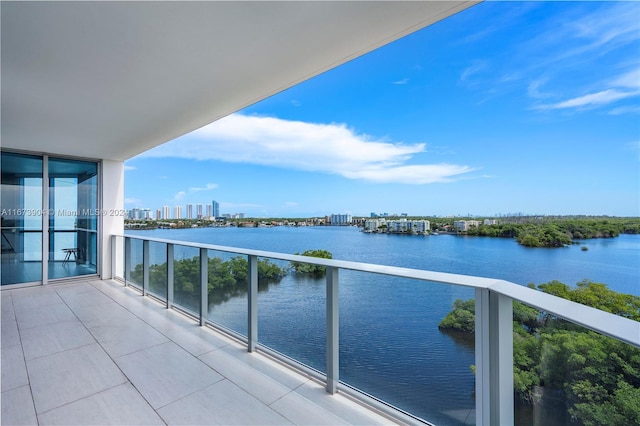 balcony featuring a water view