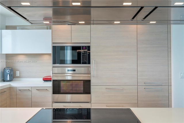 kitchen with light brown cabinetry