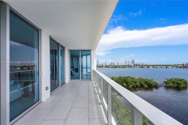 balcony featuring a water view