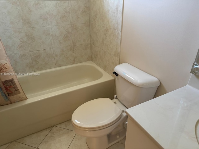 full bathroom featuring vanity, tile patterned floors, toilet, and shower / bathing tub combination