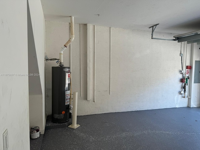 garage with electric panel and gas water heater