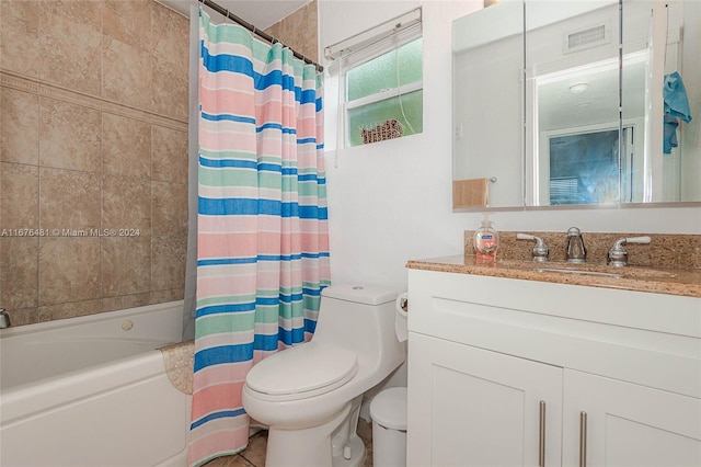 full bathroom featuring toilet, shower / bath combo, and vanity