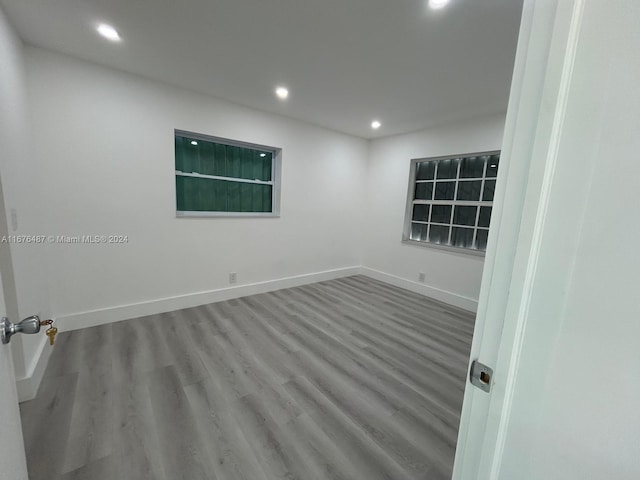 spare room featuring hardwood / wood-style flooring